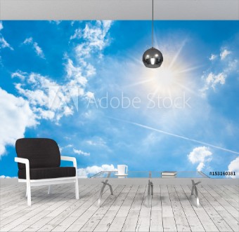 Picture of Sunny background blue sky with white clouds and sun